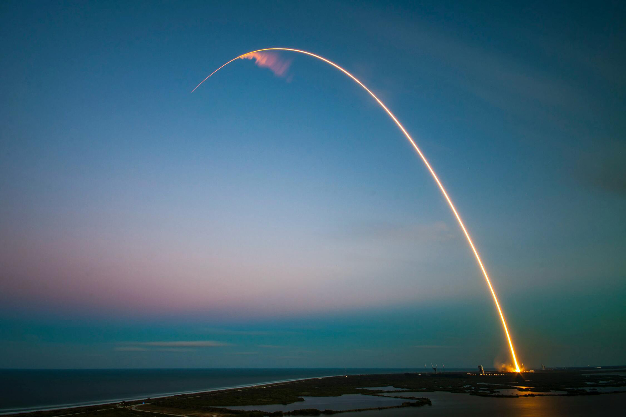 Rocket flying up during sunset